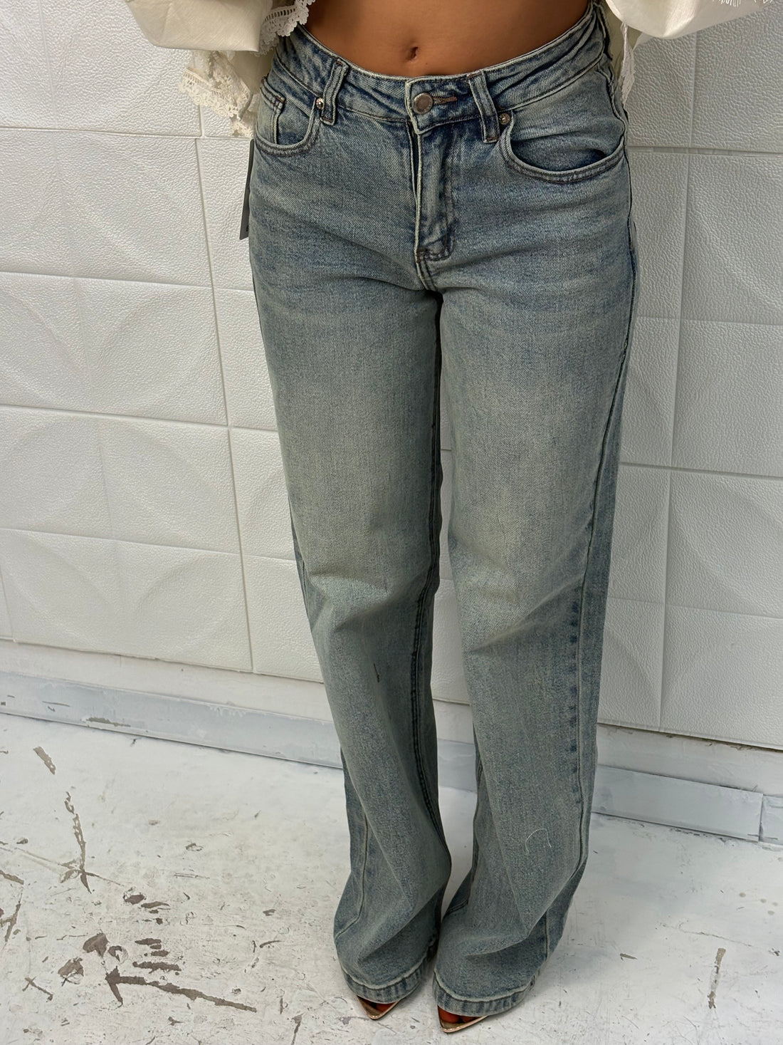 Jeans con tasche