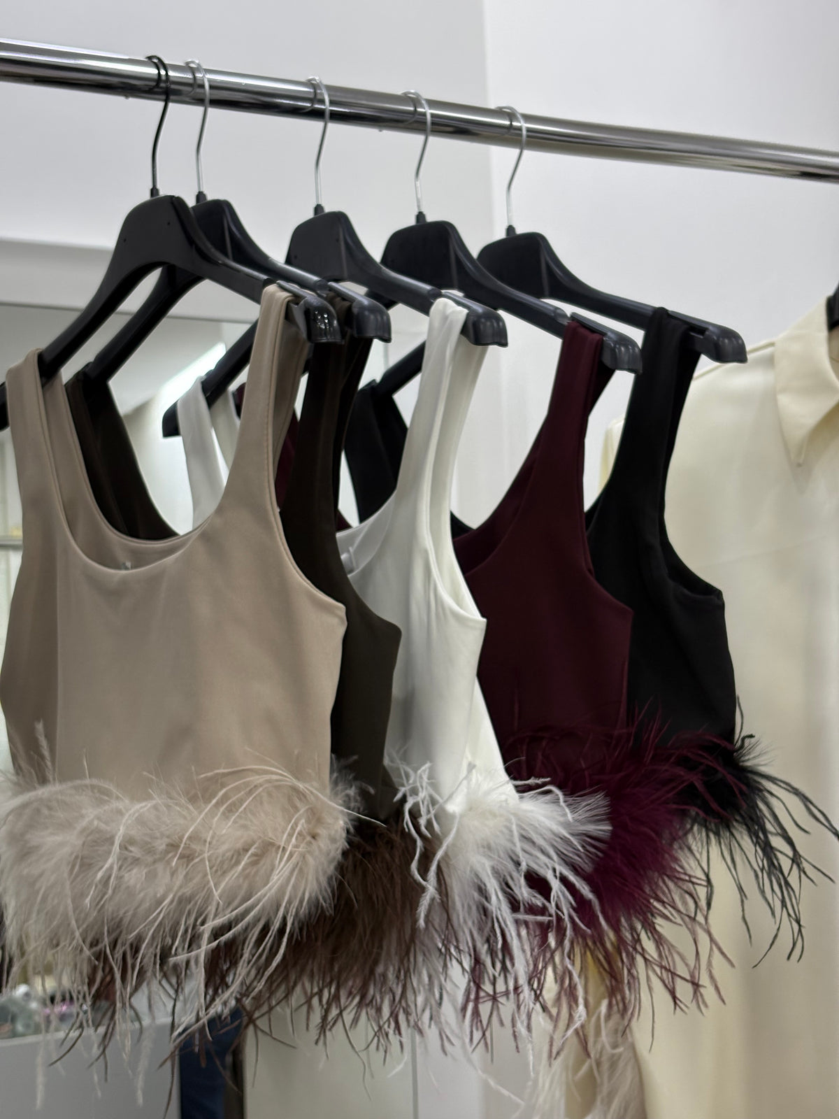 Top piume