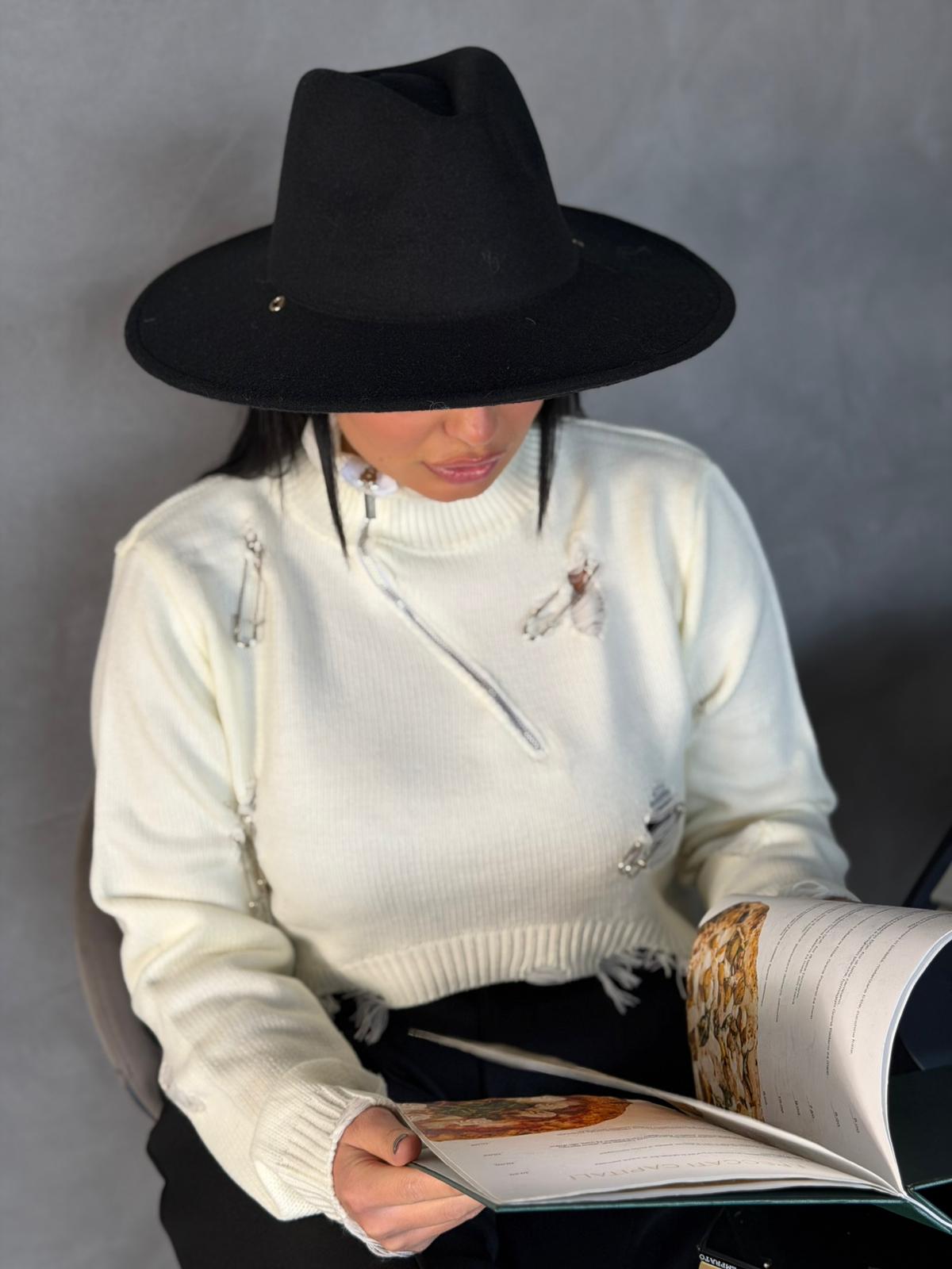 Maglione con rotture