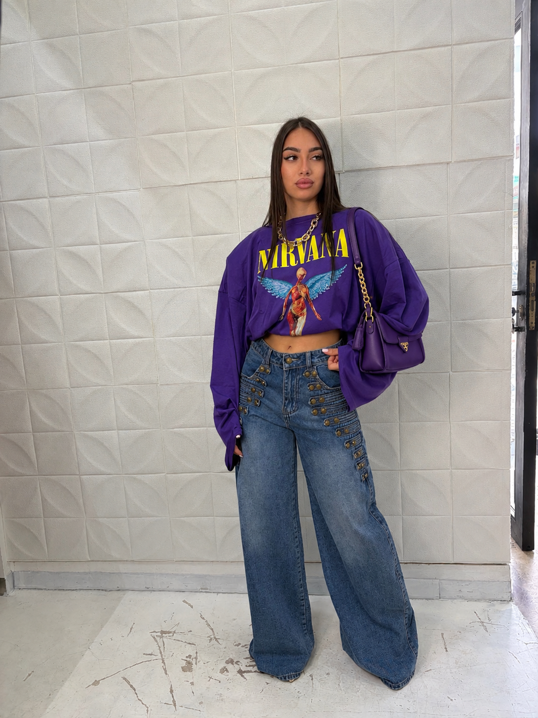 Jeans con bottoni gold