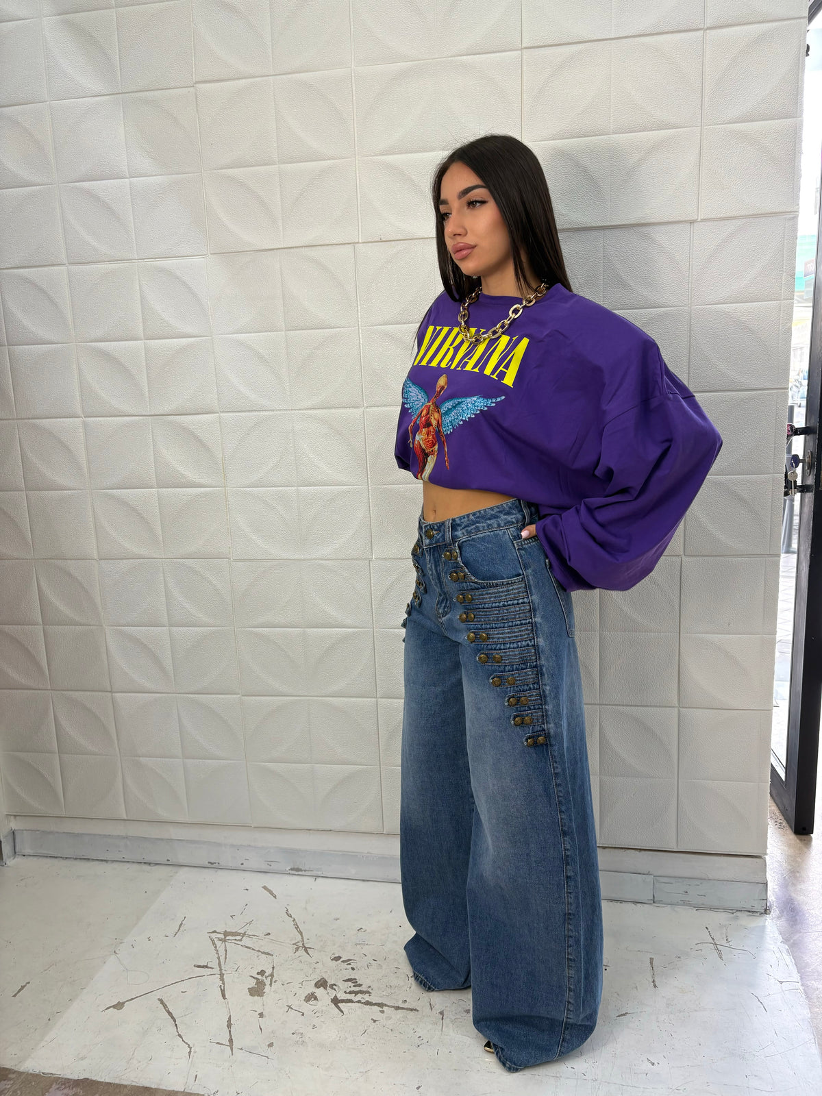 Jeans con bottoni gold