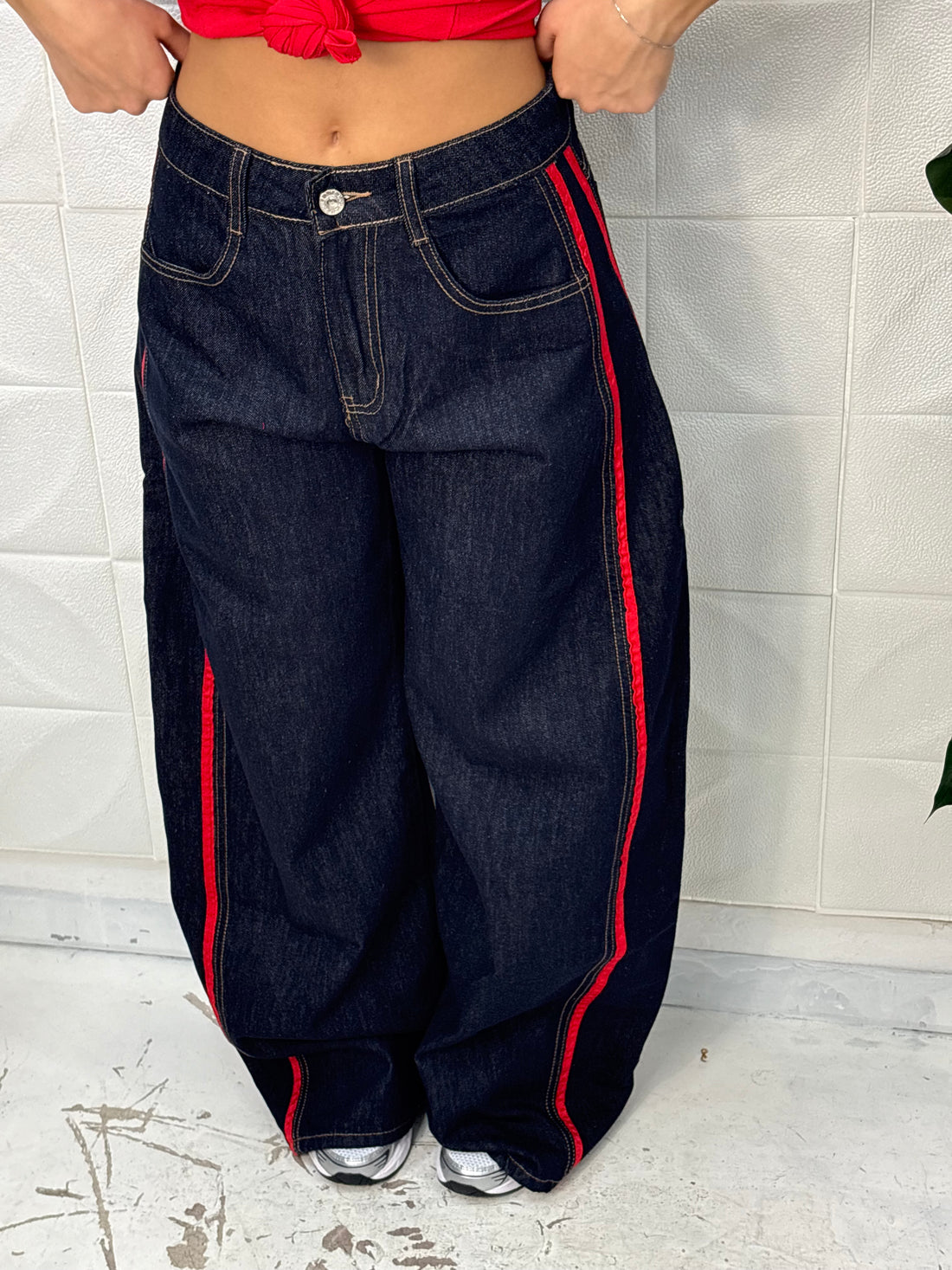 Jeans bande rosse