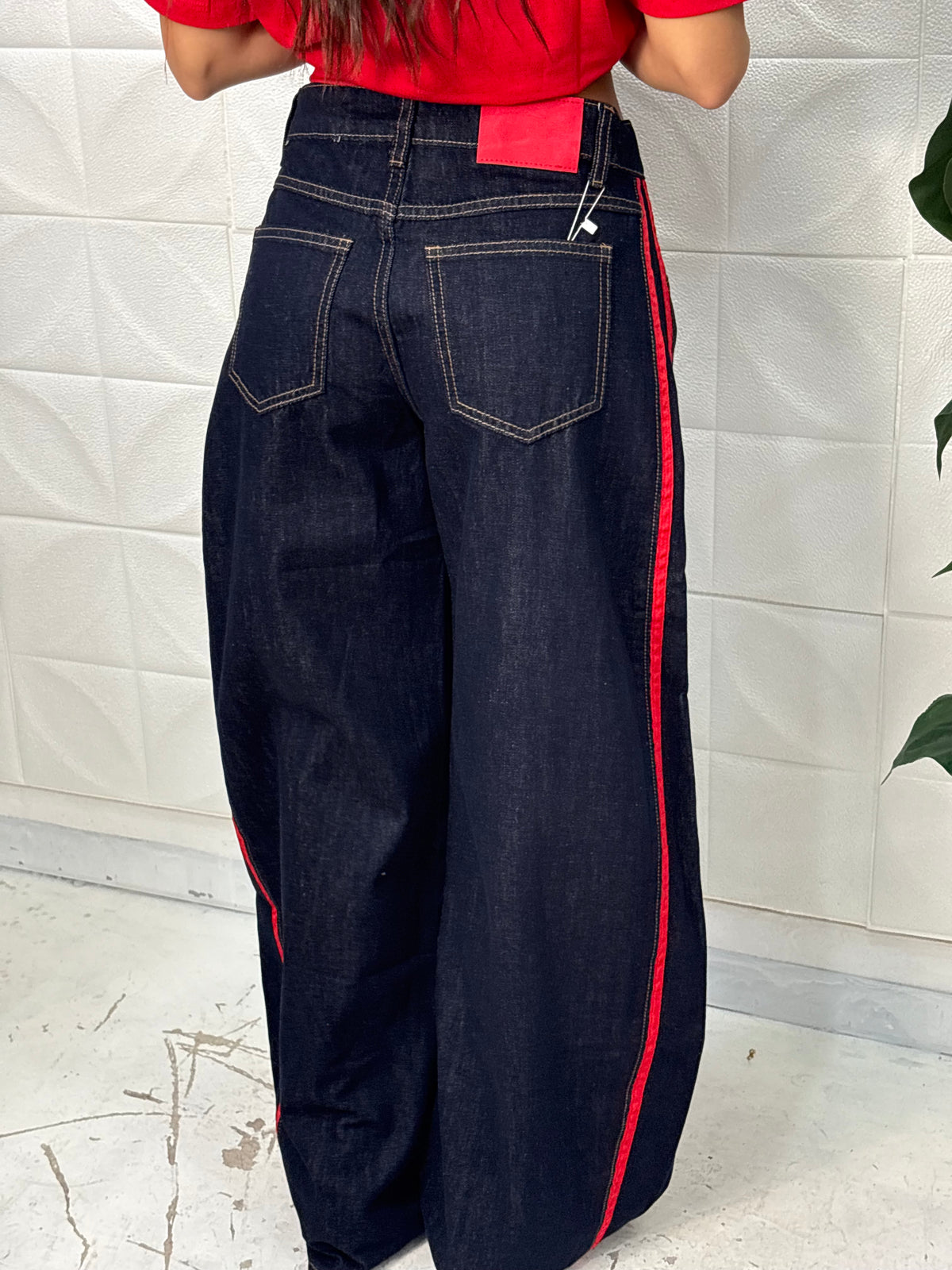 Jeans bande rosse