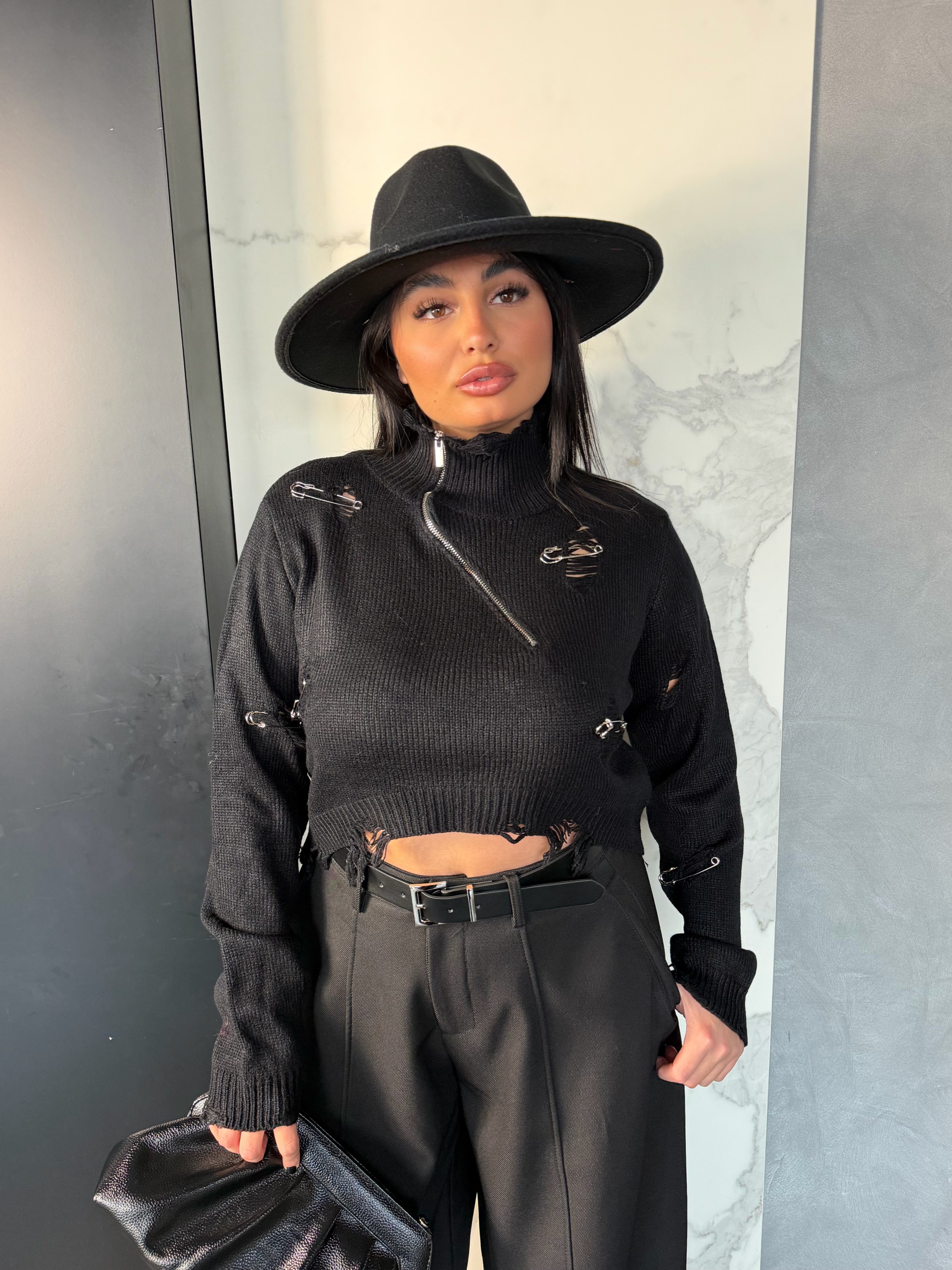 Maglione con rotture